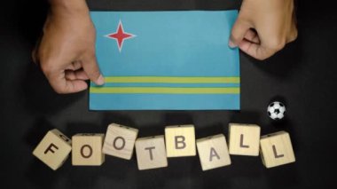 Futbol unvanlı Aruba bayrağı. futbol konsepti