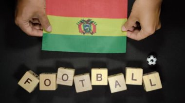 Futbol unvanlı Bolivya bayrağı. futbol konsepti