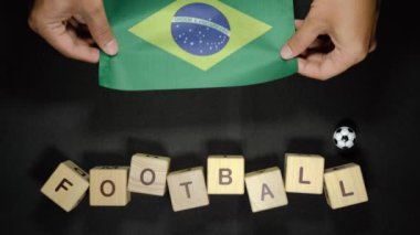 Brezilya bayrağı ve futbol unvanı. futbol konsepti