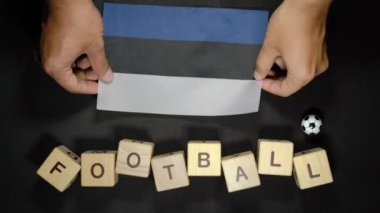 Estonya bayrağı ve futbol unvanı. futbol konsepti