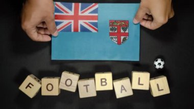 Futbol unvanlı Fiji bayrağı. futbol konsepti