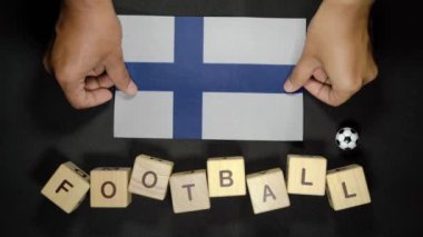 Futbol unvanlı Finlandiya bayrağı. futbol konsepti