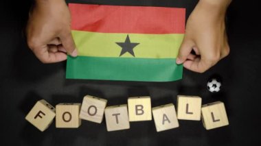 Futbol unvanlı Gana bayrağı. futbol konsepti