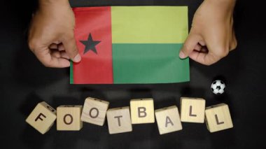 Futbol unvanlı Gine Bissau bayrağı. futbol konsepti