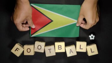 Futbol unvanlı Guyana bayrağı. futbol konsepti