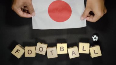 Futbol unvanlı Japonya bayrağı. futbol konsepti
