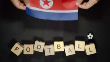 Futbol unvanlı Kuzey Kore bayrağı. futbol konsepti