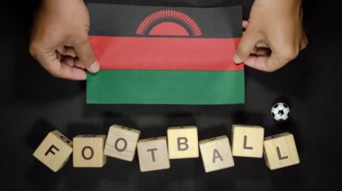 Futbol unvanlı Malavi bayrağı. futbol konsepti