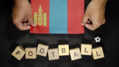 Futbol unvanlı Moğolistan bayrağı. futbol konsepti