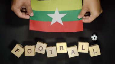 Futbol unvanlı Myanmar bayrağı. futbol konsepti