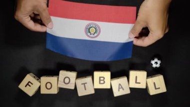 Futbol unvanlı Paraguay bayrağı. futbol konsepti