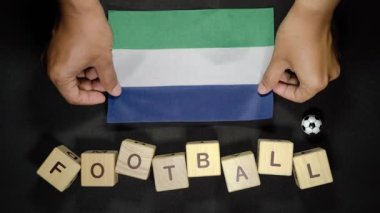 Futbol unvanlı Sierra Leone bayrağı. futbol konsepti