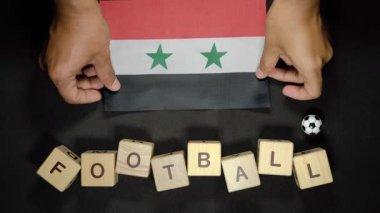 Futbol unvanlı Suriye bayrağı. futbol konsepti