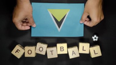 Futbol unvanlı Aziz Lucia bayrağı. futbol konsepti