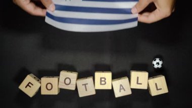 Futbol unvanlı Uruguay bayrağı. futbol konsepti