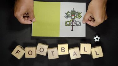 Futbol unvanlı Vatikan bayrağı. futbol konsepti