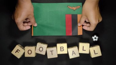 Futbol unvanlı Zambiya bayrağı. futbol konsepti