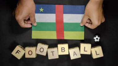 Futbol unvanlı Orta Afrika Cumhuriyeti bayrağı. futbol konsepti