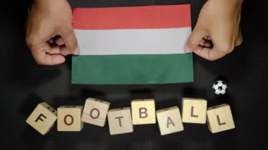 Futbol unvanlı Macaristan bayrağı. futbol konsepti