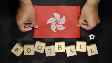 Futbol unvanlı Hong Kong bayrağı. futbol konsepti