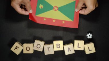 Futbol unvanlı Grenada bayrağı. futbol konsepti