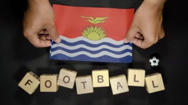 Futbol unvanlı Kiribati bayrağı. futbol konsepti