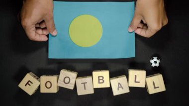 Futbol unvanlı Palau bayrağı. futbol konsepti