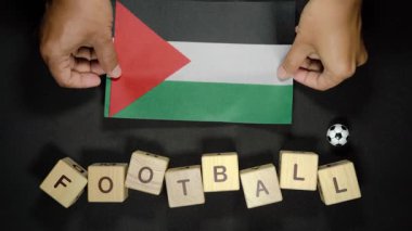 Futbol unvanlı Filistin bayrağı. futbol konsepti