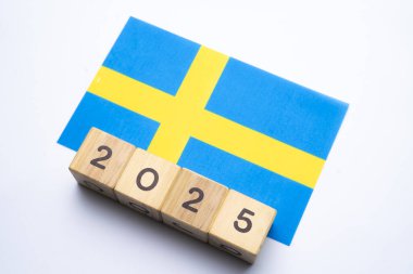 2025, İsveç bayrağı tarih engeli, kavram, İsveç için önemli etkinlikler yeni yıl, seçim, ekonomi, sosyal faaliyetler, merkez bankası, İsveç dış politikası