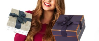 Birthday, Christmas gifts or holiday present, happy woman holding gift boxes isolated on white background, portrait