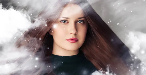 stock image Winter beauty, Christmas time and happy holidays, beautiful woman with long hairstyle and natural make-up behind frozen window, snowing snow design as xmas, New Year and holiday lifestyle portrait