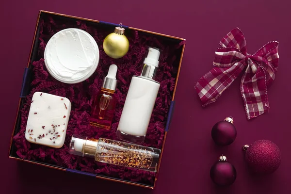 Christmas gift set, xmas holidays beauty box subscription package and luxury skincare products flatlay, cosmetic flat lay on purple background, cosmetics as holiday present or shopping delivery, top