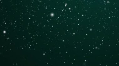 Kış tatilleri ve kış arkaplanı, şenlikli yeşil zemine düşen beyaz kar, kar taneleri bokeh ve kar tanecikleri Noel ve karlı bayram tasarımı için soyut kar sahnesi olarak soyut kar parçacıkları. Yüksek