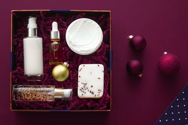Christmas gift set, xmas holidays beauty box subscription package and luxury skincare products flatlay, cosmetic flat lay on purple background, cosmetics as holiday present or shopping delivery, top