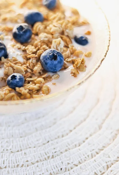 Breakfast idea and delicious food, breakfast cereal grains with lactose-free yoghurt and fresh organic blueberries in a bowl, tasty and healthy recipe, food photography
