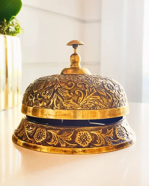 Luxury hotel and five stars room service, golden vintage reception bell for travel and hospitality brand