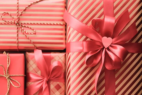Holiday gifts and wrapped luxury presents, coral gift boxes as surprise present for birthday, Christmas, New Year, Valentines Day, boxing day, wedding and holidays shopping or beauty box delivery