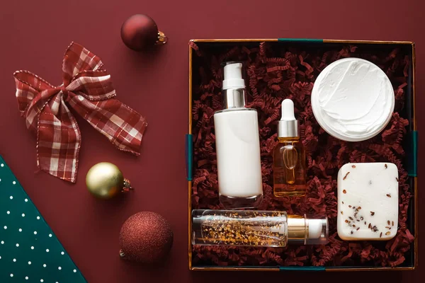 Christmas gift set, xmas holidays beauty box subscription package and luxury skincare products flatlay, cosmetic flat lay on chocolate background, cosmetics as holiday present or shopping delivery