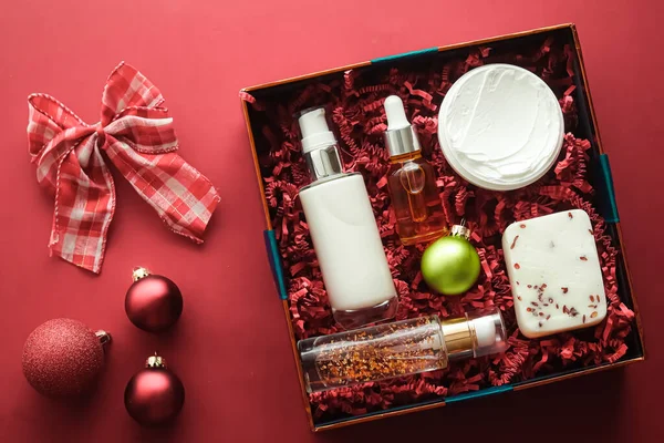 Christmas gift set, xmas holidays beauty box subscription package and luxury skincare products flatlay, cosmetic flat lay on coral background, cosmetics as holiday present or shopping delivery, top