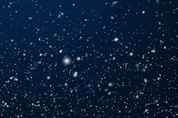 冬の休日と冬の背景 濃い青の背景に降る白い雪 雪の結晶ボケと雪の粒子はクリスマスと雪の休日のデザインのための抽象的な雪のシーンとして コピースペース ストックフォト