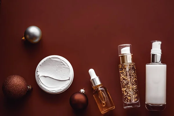Beauty products and Christmas, luxury skincare, spa and cosmetic hair or body care product flat lay on chocolate background, wellness cosmetics as holiday gift, online shopping delivery, flatlay.
