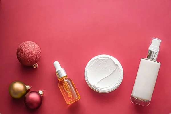 Beauty products and Christmas, luxury skincare, spa and cosmetic hair or body care product flat lay on coral background, wellness cosmetics as holiday gift, online shopping delivery, flatlay.