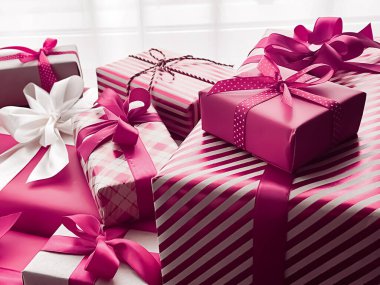 Holiday gifts and wrapped luxury presents, pink gift boxes as surprise present for birthday, Christmas, New Year, Valentines Day, boxing day, wedding and holidays shopping or beauty box delivery clipart