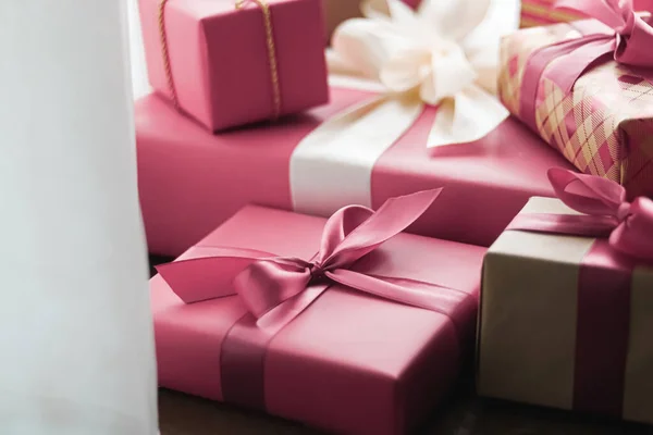 Holiday gifts and wrapped luxury presents, pink gift boxes as surprise present for birthday, Christmas, New Year, Valentines Day, boxing day, wedding and holidays shopping or beauty box delivery