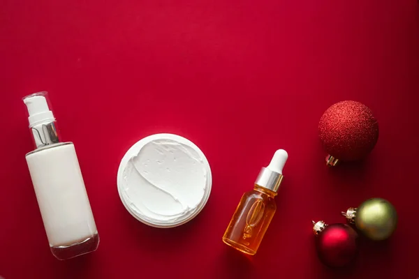 Beauty products and Christmas, luxury skincare, spa and cosmetic hair or body care product flat lay on red background, wellness cosmetics as holiday gift, online shopping delivery, flatlay.