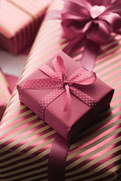 Holiday gifts and wrapped luxury presents, pink gift boxes as surprise present for birthday, Christmas, New Year, Valentines Day, boxing day, wedding and holidays shopping or beauty box delivery