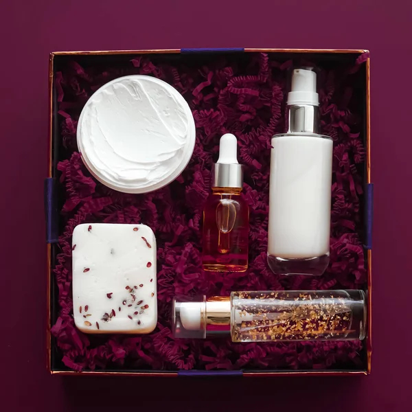 Beauty box subscription package and luxury skincare products, spa and cosmetic body care product flat lay on purple background, wellness cosmetics as holiday gift, online shopping delivery, flatlay