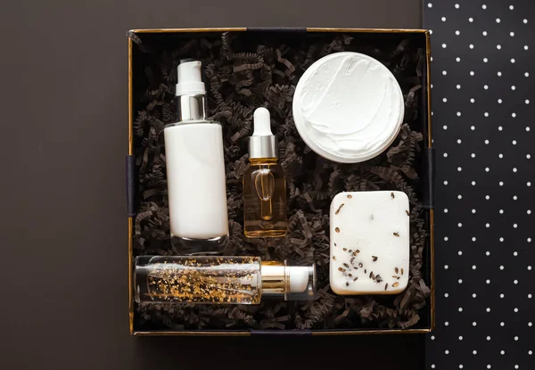 Beauty box subscription package and luxury skincare products, spa and cosmetic body care product flat lay on brown background, wellness cosmetics as holiday gift, online shopping delivery, flatlay