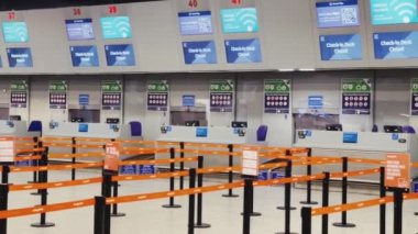 Luton, Bedfordshire, England, United Kingdom circa January 2023: EasyJet check-in desks at London Luton Airport