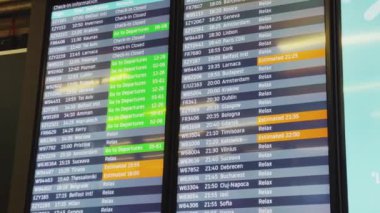 Luton, Bedfordshire, England, United Kingdom circa January 2023: Departures board screen at London Luton Airport